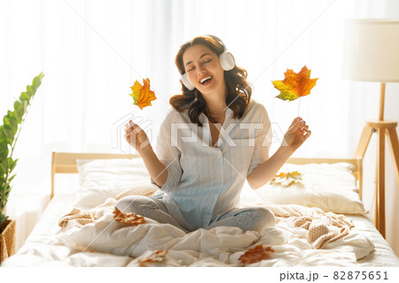 woman enjoying sunny morning woman enjoying sunny morning 82875651