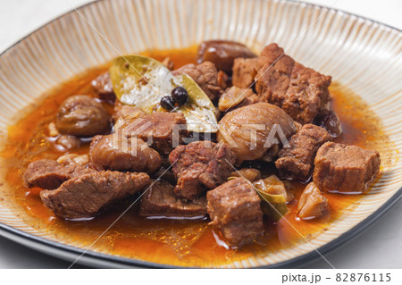 beef stew with onion and spices 82876115