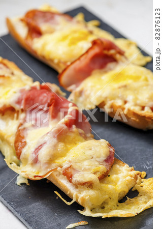 baguette baked with ham and cheese 82876123