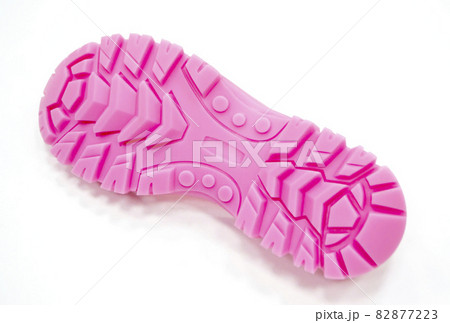 3D printer printed pink shoe soles in natural size isolated on white background 82877223