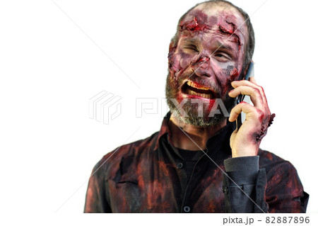 Zombie male makeup for halloween concept. Blood on skin face 82887896