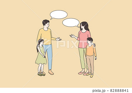 Smiling parents of teen children talk outside 82888841