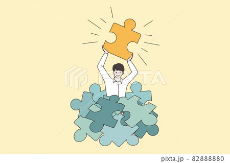 Happy man hold jigsaw puzzle find business solution 82888880