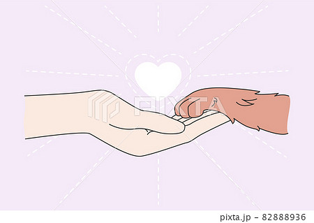 Human hand hold pet paw show love 82888936