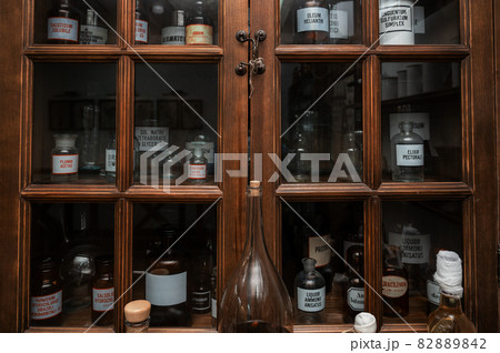 Empty scent bottles in old pharmacy 82889842