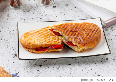 Fresh grilled panini pepperoni on light background 82891123