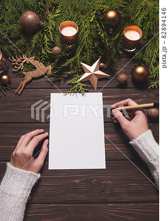 Christmas mockup for writing goals, plans dreams, make to do list for New Year. 82894146