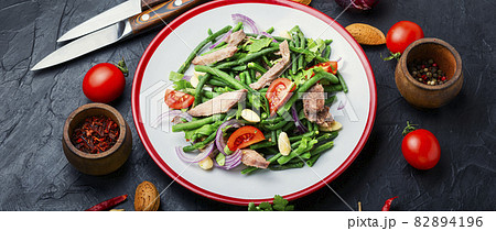 Meat salad with asparagus beans and tomatoes. Meat salad with asparagus beans and tomatoes. 82894196