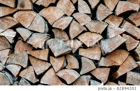 Close-up texture of pine logs prepared and folded neatly Close-up texture of pine logs prepared and folded neatly 82894201