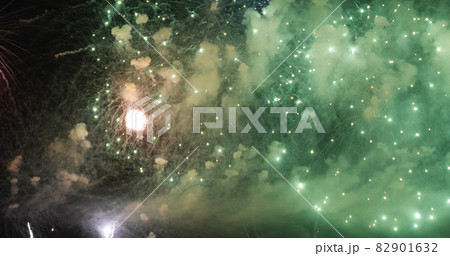 Green Firework celebrate anniversary happy new year 2022, 4th of july holiday festival. Green firework in night time celebrate national holiday. Countdown to new year 2022 festival party time event 82901632