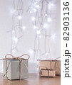 Christmas gifts in craft style on background of bokeh of lights 82903136