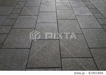 detail of tiles at the street give a harmonic pattern 82903866