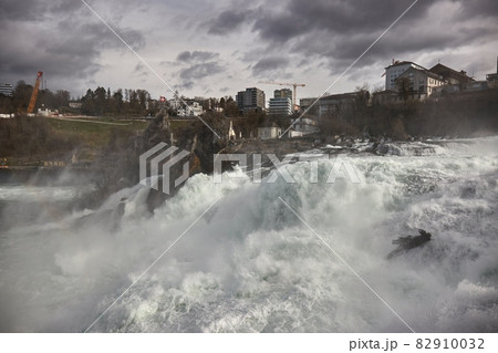 Rhine Falls waterfall in Switzerland, powerful flow in slow motion 82910032
