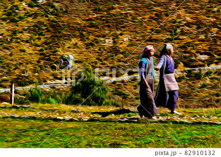 Sherpa girls in typical clothes holding hands 82910132