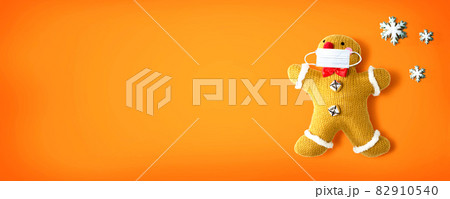 Gingerbread wearing a face mask Gingerbread wearing a face mask 82910540
