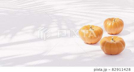 Pumpkins on white background for advertising on autumn holidays or sales, 3d banner render 82911428