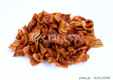 Banana slice chips on white background. Banana slice chips on white background. 82913996