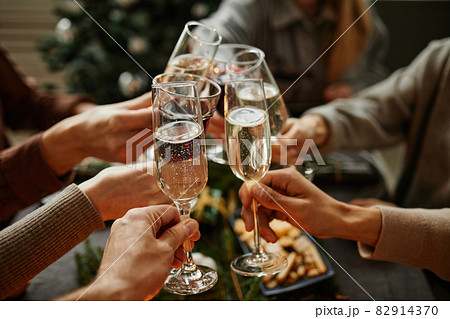 Toasting at Christmas Dinner 82914370