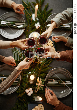 Friends Enjoying Christmas Dinner Top View 82914379