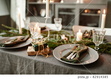 Elegant Dining Table on Christmas with Candles 82914385