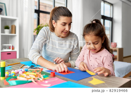 daughter with mother making applique at home daughter with mother making applique at home 82919466