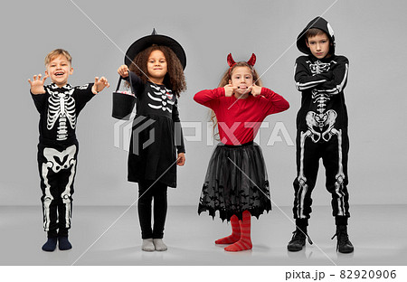 children in halloween costumes trick-or-treating children in halloween costumes trick-or-treating 82920906