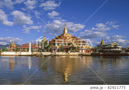 Myanmar, Shan State, Inle Lake, Buddhist temple reflecting in lake Myanmar, Shan State, Inle Lake, Buddhist temple reflecting in lake 82921775