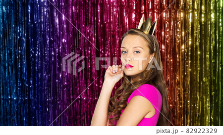 young woman or teen girl in pink dress 82922329