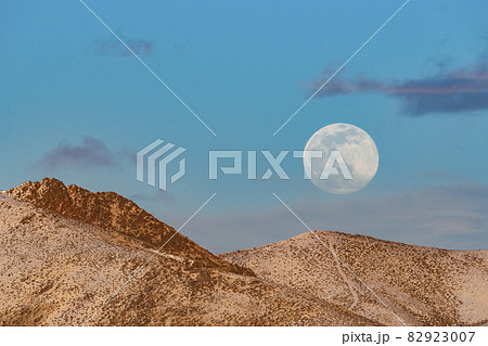 USA, Idaho, Bellevue, Full moon over foothills 82923007