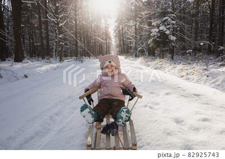 , Poland, Subcarpathia, Girl having fun in winter 82925743