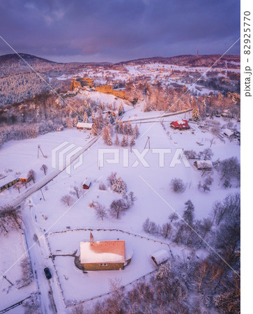 Poland, Subcarpathia, Odrzykon, Aerial view of ruins of Kamieniec Castle in winter 82925770