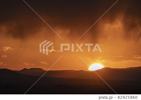 Usa, New Mexico, Santa Fe, El Dorado, Sun setting over landscape with clouds 82925860