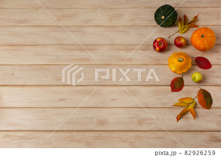 Fall yellow, red and green pumpkins background 82926259
