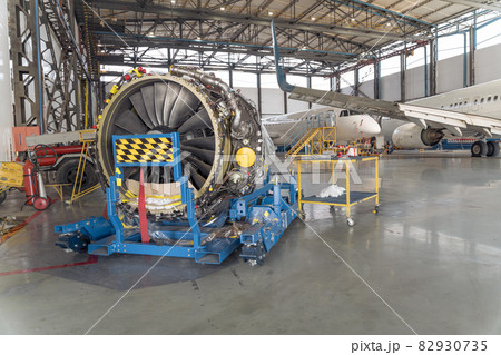 Big aircraft turbine in hangar during overhaul 82930735