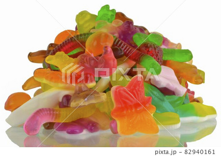 Colorful jelly gummy candies, isolated on white background. Multicolored jelly candies isolated on a white background. Jelly Bean. Mirror reflection of jelly candies 82940161