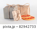 Gift boxes in brown craft paper  82942733