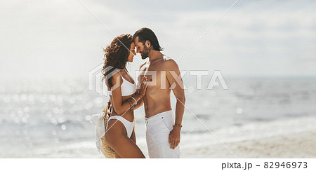 Romantic Couple in Love on the Beach Romantic Couple in Love on the Beach 82946973