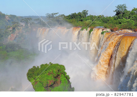 View of Iguazu falls at sunset time. 82947781
