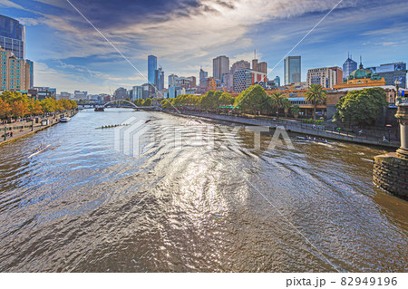 Panoramic view of Melbourne skyline taken from a bridge over the Yarra river Panoramic view of Melbourne skyline taken from a bridge over the Yarra river 82949196
