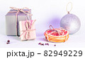 Christmas gifts in craft style with slices of dry grapefruit 82949229