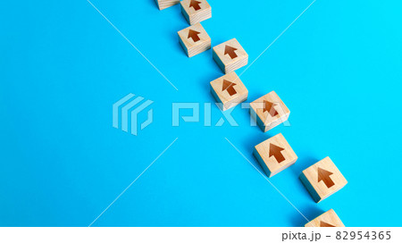 Chain of arrows blocks. Consistency and focus. Concept of conformism, vertical of power. Unchanging course of development. Moving forward. Step by step process. Education and skill growth. Chain of arrows blocks. Consistency and focus. Concept of conformism, vertical of power. Unchanging course of development. Moving forward. Step by step process. Education and skill growth. 82954365