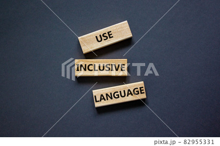 Use inclusive language symbol. Wooden blocks with words 'Use inclusive language'. Beautiful grey background. Business and use inclusive language concept. Copy space. Use inclusive language symbol. Wooden blocks with words 'Use inclusive language'. Beautiful grey background. Business and use inclusive language concept. Copy space. 82955331