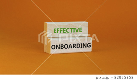 Effective onboarding symbol. Wooden blocks with words Effective onboarding on beautiful orange background. Business, HR and effective onboarding concept. Copy space. Effective onboarding symbol. Wooden blocks with words Effective onboarding on beautiful orange background. Business, HR and effective onboarding concept. Copy space. 82955358