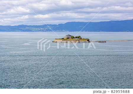 Small island at access to Geiranger fjord in Norway at daytime Small island at access to Geiranger fjord in Norway at daytime 82955688