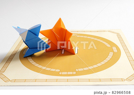 A Wrestler Of Paper Sumo Who Is Pushed And Stock Photo