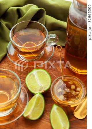 Hot refreshing citrus tea in glass close up Hot refreshing citrus tea in glass close up 82966509
