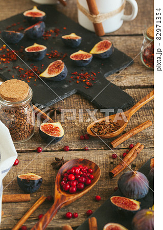 New Year composition with mulled wine on dark wooden background New Year composition with mulled wine on dark wooden background 82971354