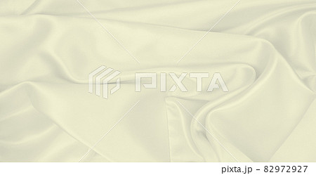 Smooth elegant golden silk or satin luxury cloth texture as wedding background. Luxurious background design. In Sepia toned. Retro style 82972927
