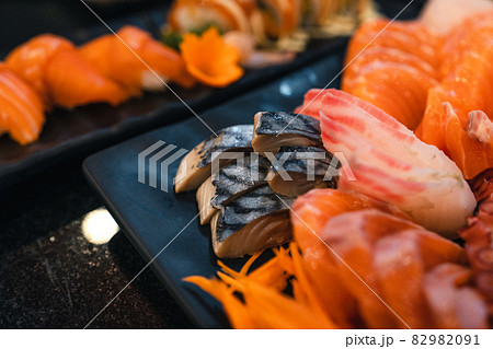 Sashimi and sashimion a plate in a Japanese restaurant 82982091