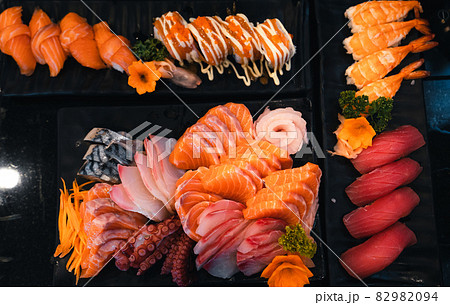 Sashimi and sashimion a plate in a Japanese restaurant 82982094
